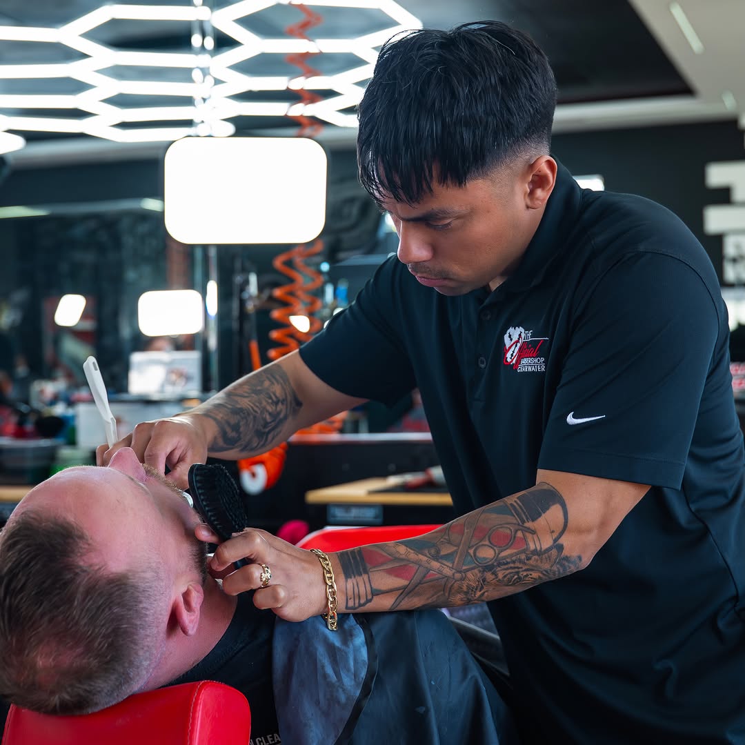 Marco lining up a client’s beard at The Official Barbershop in Clearwater, Florida